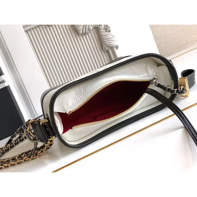 Chanel Womens Bucket Bag - Black & White Quilted Leather, Gold-Tone CC Logo & Two-Tone Chain Strap, Stylish Crossbody Bag for Luxury Fashion #A56750