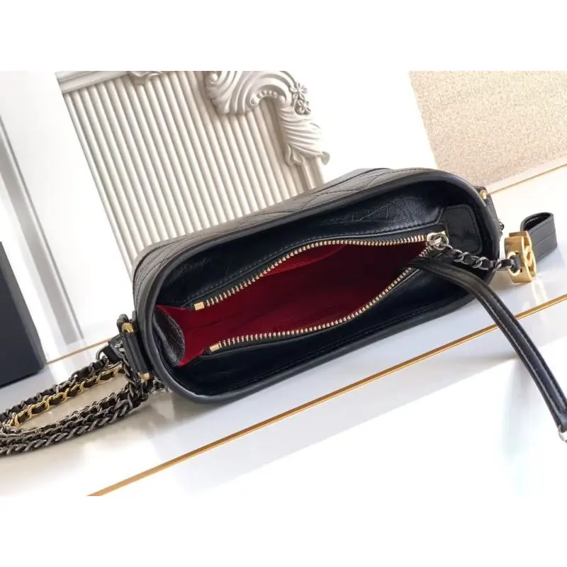 Chanel Womens Bucket Bag - Black & White Quilted Leather, Gold-Tone CC Logo & Two-Tone Chain Strap, Stylish Crossbody Bag for Luxury Fashion #A56750