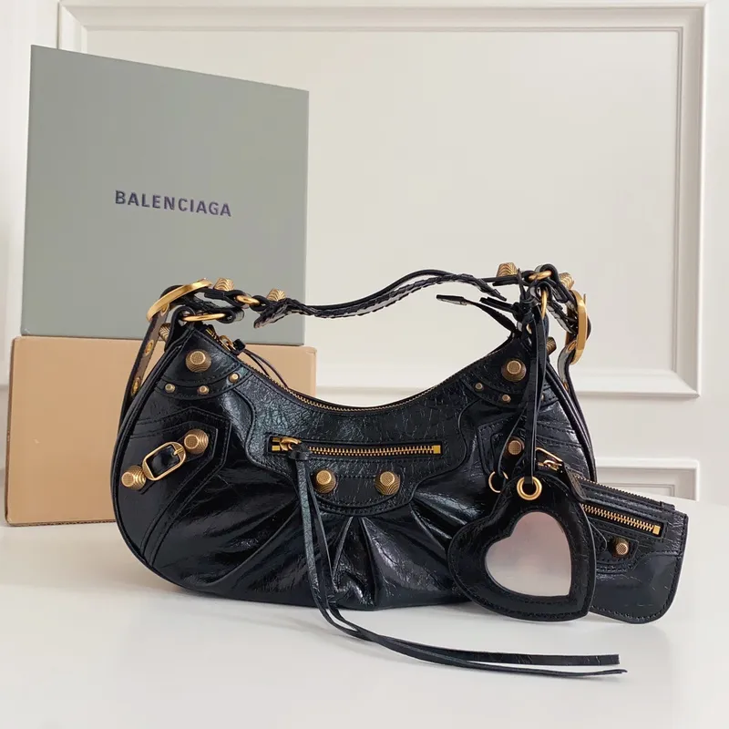 Balenciaga - Inspired Studded Shoulder Bags in Vibrant Color Palettes #A53897 Balenciaga - Inspired Studded Shoulder Bags in Vibrant Color Palettes #A53897