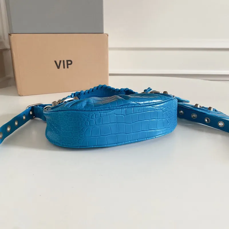 Balenciaga - Inspired Studded Shoulder Bags in Vibrant Color Palettes #A53897 Balenciaga - Inspired Studded Shoulder Bags in Vibrant Color Palettes #A53897