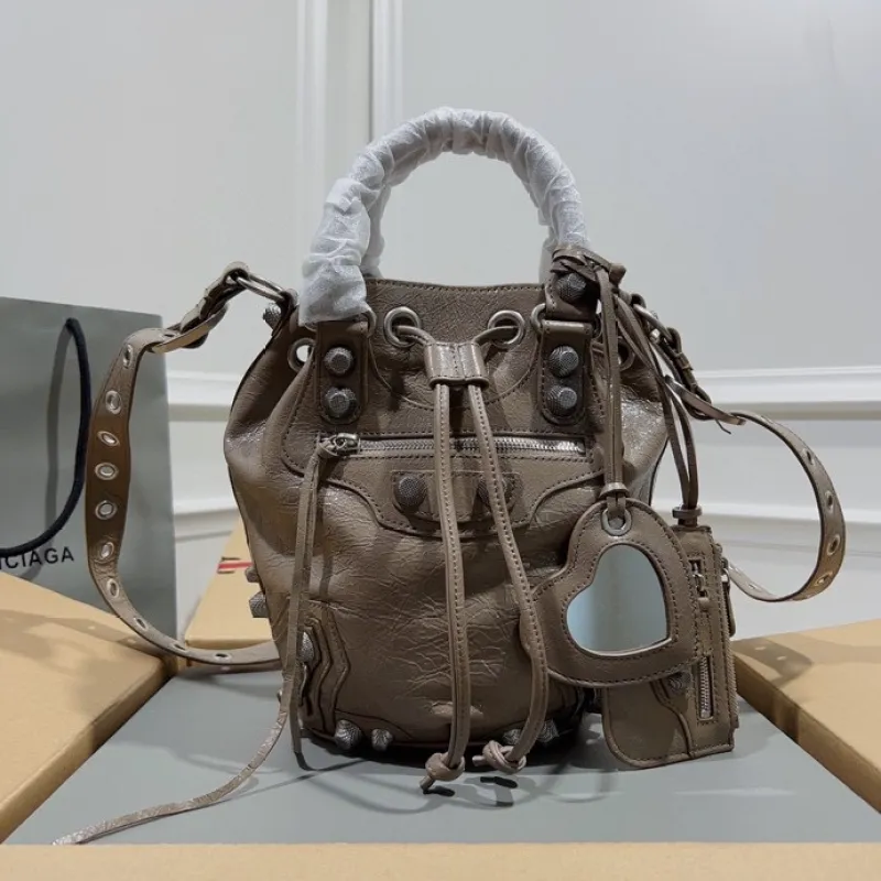 Balenciaga Bucket Bag Burgundy Leather Studded Edges A Bold Fashion Statement size:30×23×17cm #A54208