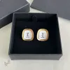 Saint Laurent White Mother Of Pearl Square Cassandre Logo Stud Earrings Gold Trim Designer Jewelry #A65954