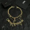 Saint Laurent Cassandre Multi Layer Logo Charm Gold Choker Necklace for Women #A65948 Saint Laurent Cassandre Multi Layer Logo Charm Gold Choker Necklace for Women #A65948