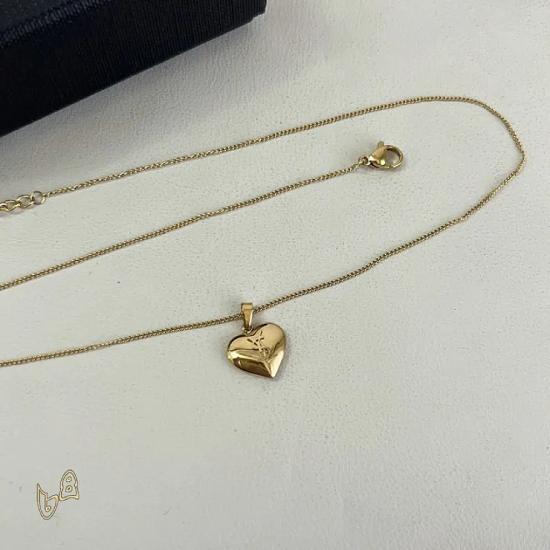 Saint Laurent Solid Heart Pendant Gold Thin Chain Choker Necklace Women Designer Jewelry #A65952 Saint Laurent Solid Heart Pendant Gold Thin Chain Choker Necklace Women Designer Jewelry #A65952